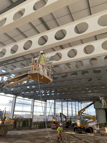 Commercial construction requiring intumescent coating
